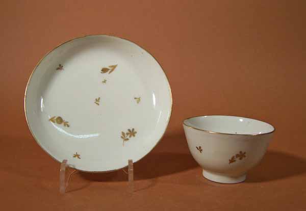 two tea bowls and saucers